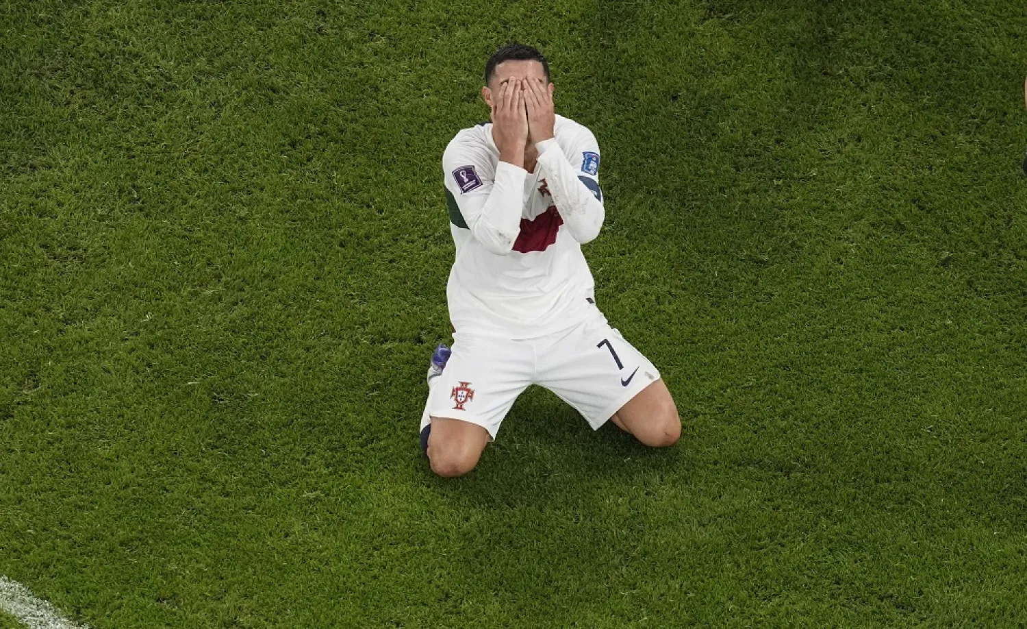 Portugal's Cristiano Ronaldo, reacts after he failed to score during the World Cup quarterfinal soccer match between Morocco and Portugal, at Al Thumama Stadium in Doha, Qatar, Saturday, Dec. 10, 2022. (AP)