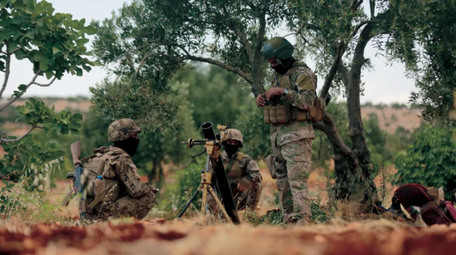 مقاتلون من المعارضة في ريف حلب (الشرق الأوسط)