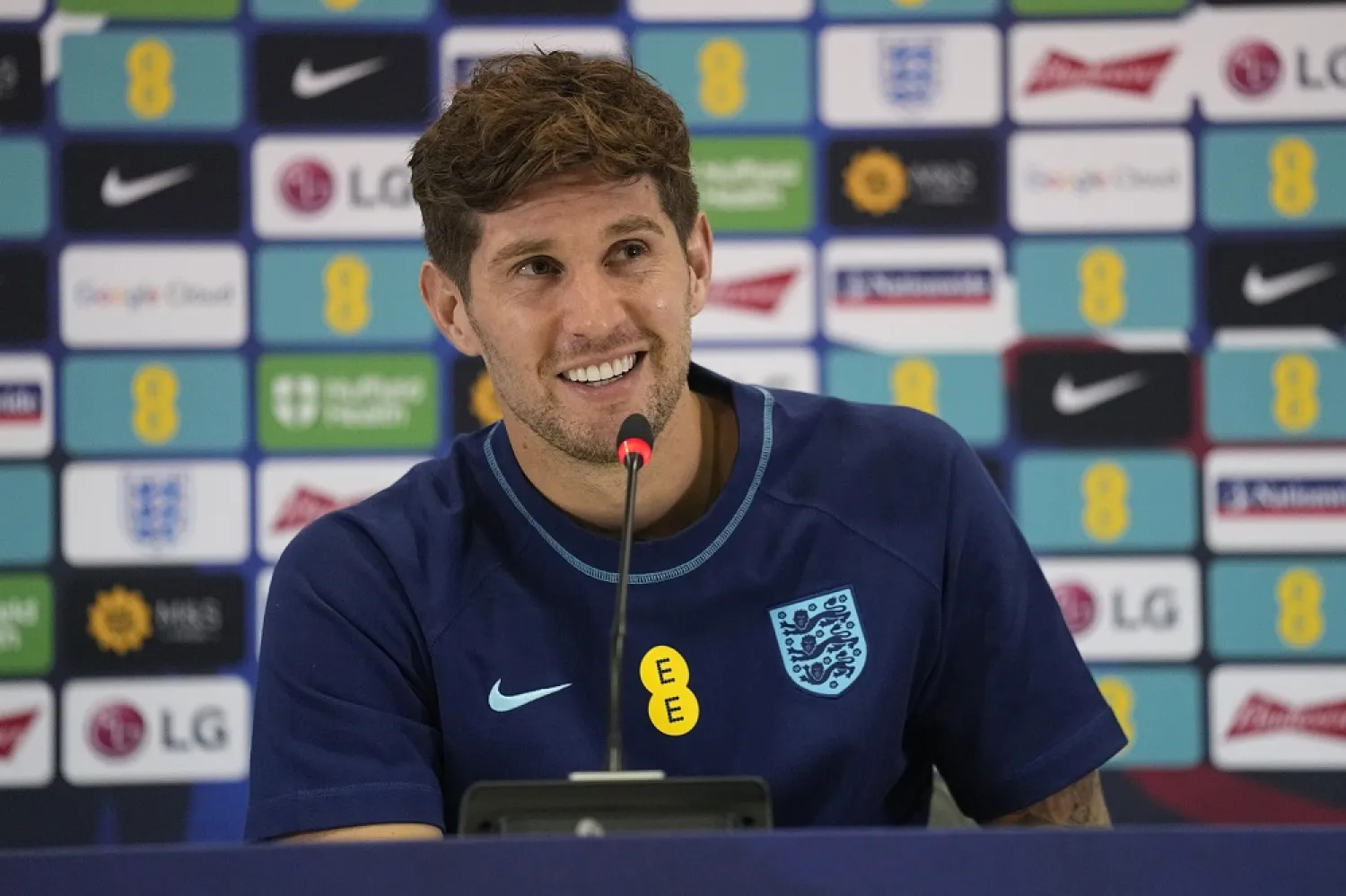 England's John Stones speaks to the media during a press conference at at Al Wakrah Sports Complex, in Al Wakrah, Qatar, Friday, Dec. 2, 2022. (AP)