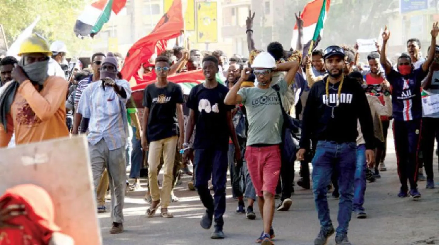 Protesters take to the streets of Khartoum on December 8. (AFP)