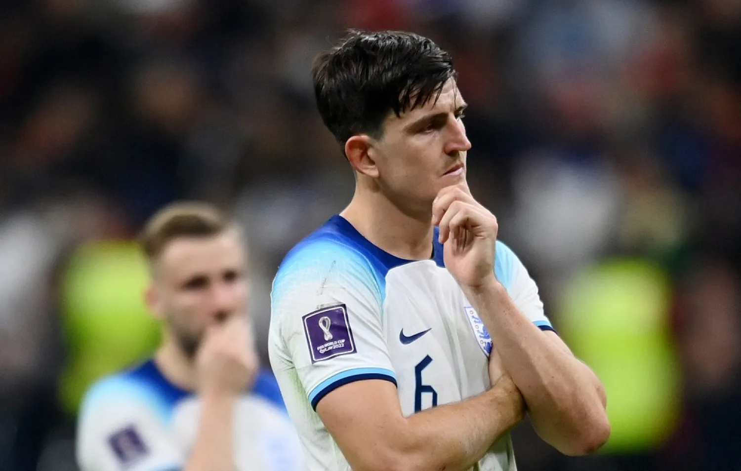 Football - FIFA World Cup Qatar 2022 - Quarter Final - England v France - Al Bayt Stadium, Al Khor, Qatar - December 11, 2022 England's Harry Maguire looks dejected after the match as England are eliminated from the World Cup. (Reuters)