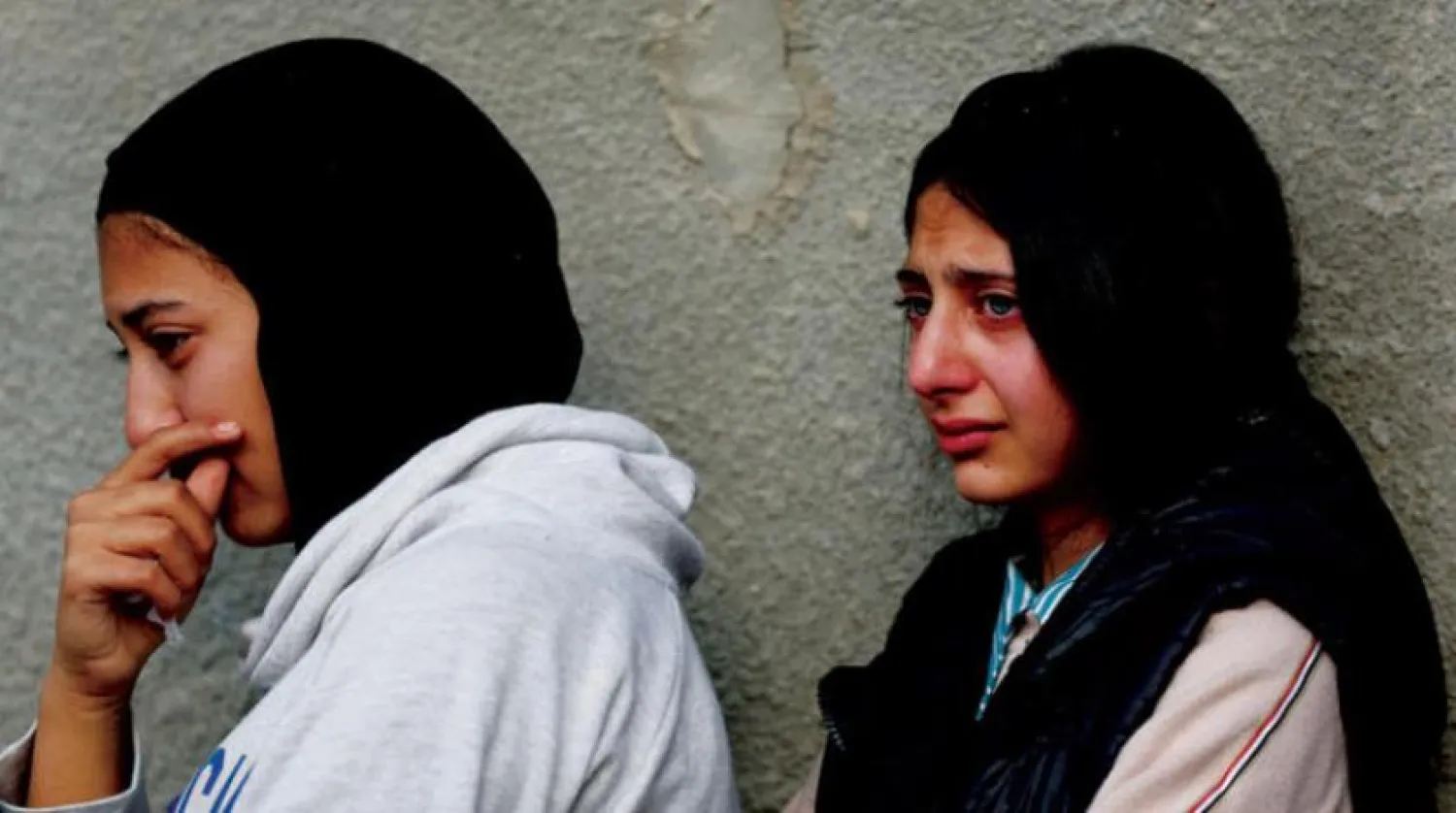 Two girls at the funeral of Jana Zakarneh (Reuters)
