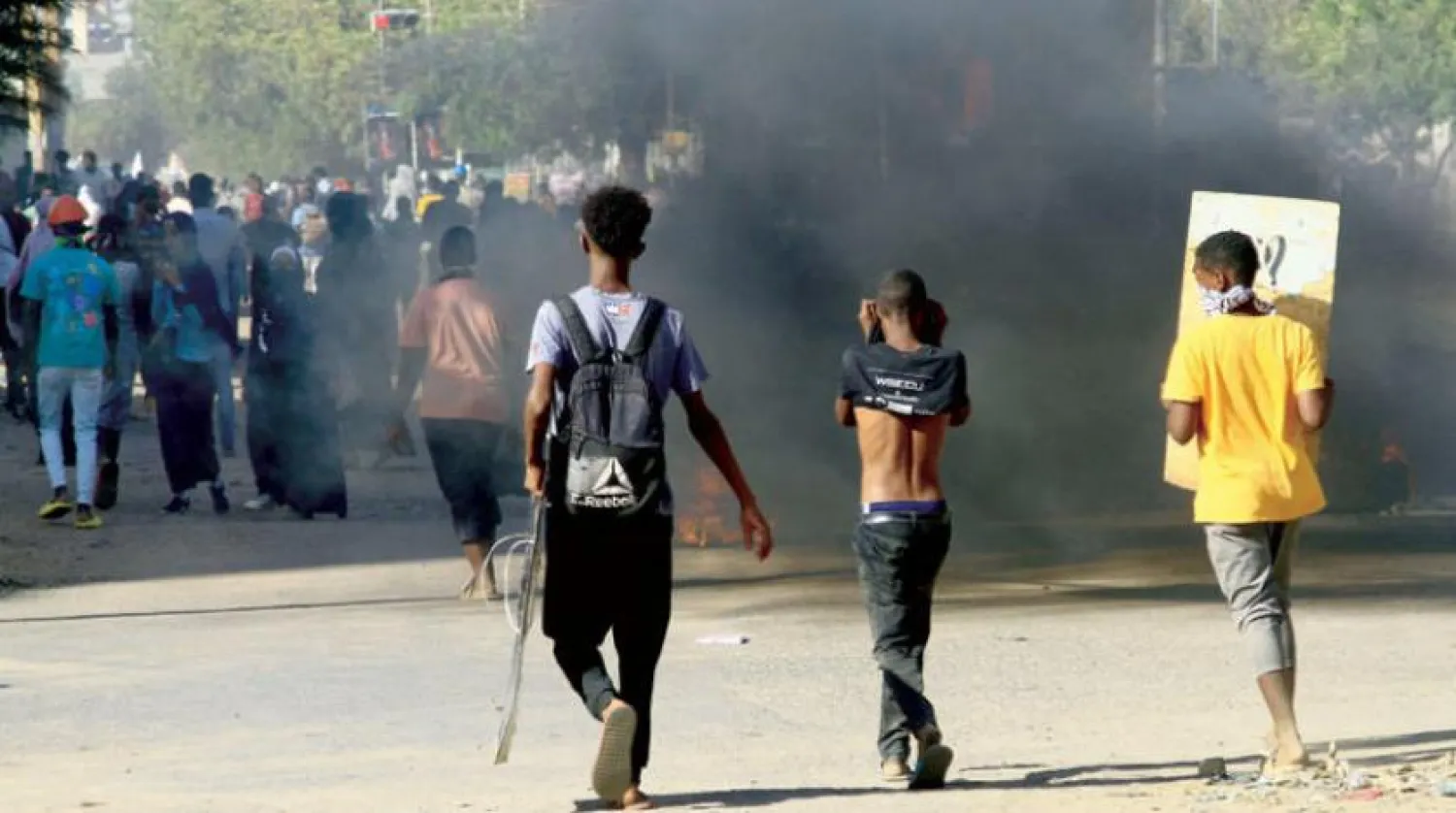 Sudanlılar, siyasi ve toplumsal huzursuzluklar ve kötüleşen yaşam koşulları sonucunda zor bir süreçten geçiyor. (AFP)