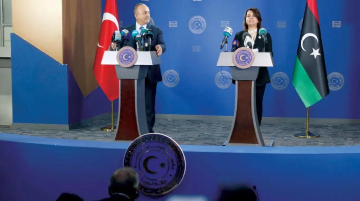 Dışişleri Bakanı Çavuşoğlu ve Libyalı mevkidaşı Menguş geçen ekim ayında Trablus'ta bir araya geldiler. (AFP)