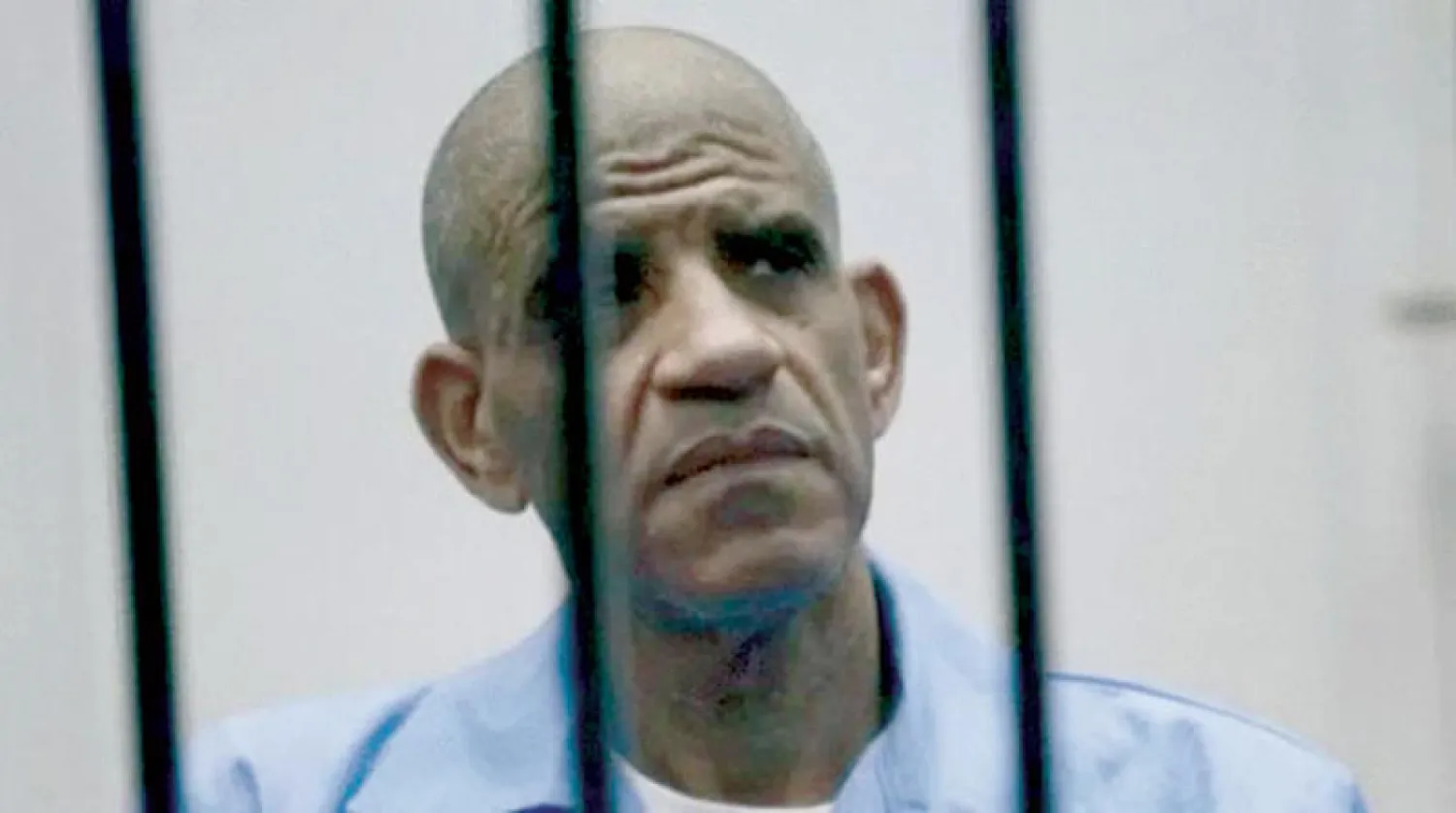 عبد الله السنوسي أمام المحكمة في جلسة سابقة (رويترز)