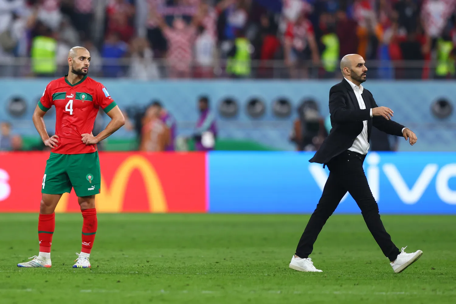 17 December 2022, Qatar, Al-Rayyan: Morocco coach Walid Regragui (R) and Sofyan Amrabat seen after the FIFA World Cup Qatar 2022 third place soccer match between Croatia and Morocco at Khalifa International Stadium. Photo: Tom Weller/dpa