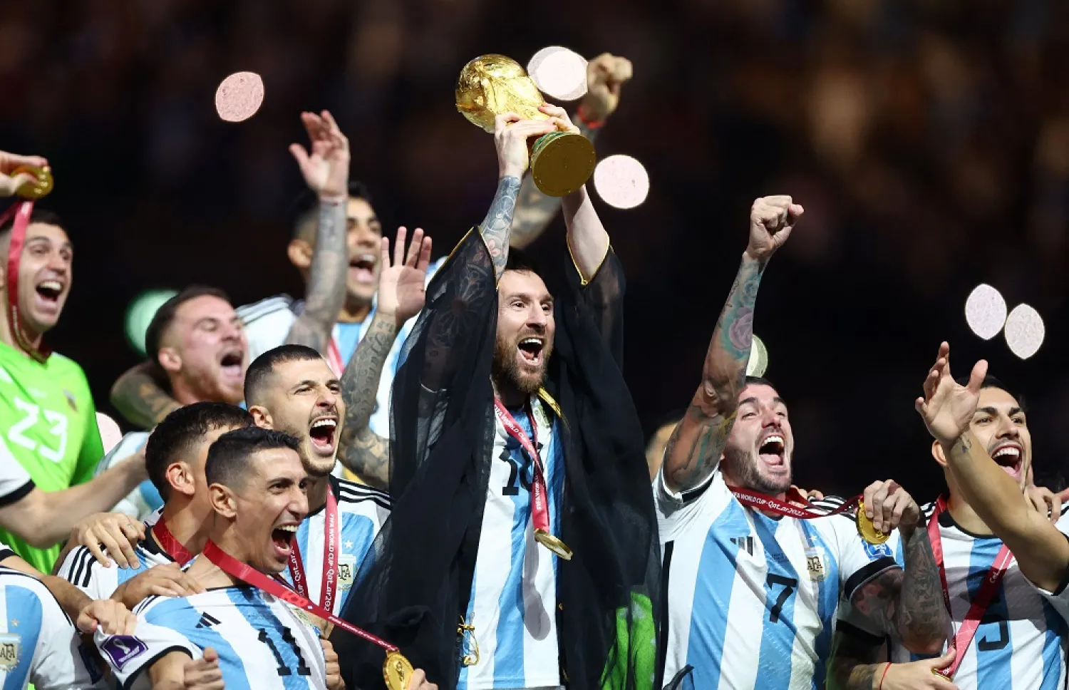 Football - FIFA World Cup Qatar 2022 - Final - Argentina v France - Lusail Stadium, Lusail, Qatar - December 18, 2022 Argentina's Lionel Messi celebrates winning the World Cup with the trophy. (Reuters)