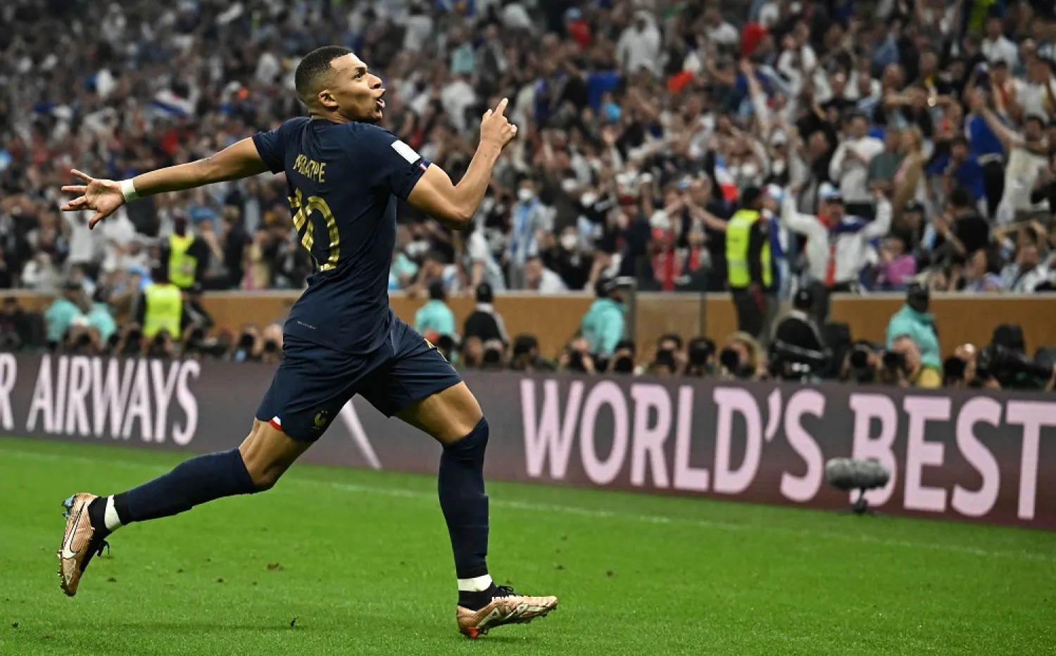Football - FIFA World Cup Qatar 2022 - Final - Argentina v France - Lusail Stadium, Lusail, Qatar - December 18, 2022 France's Kylian Mbappe celebrates scoring their second goal. (Reuters)