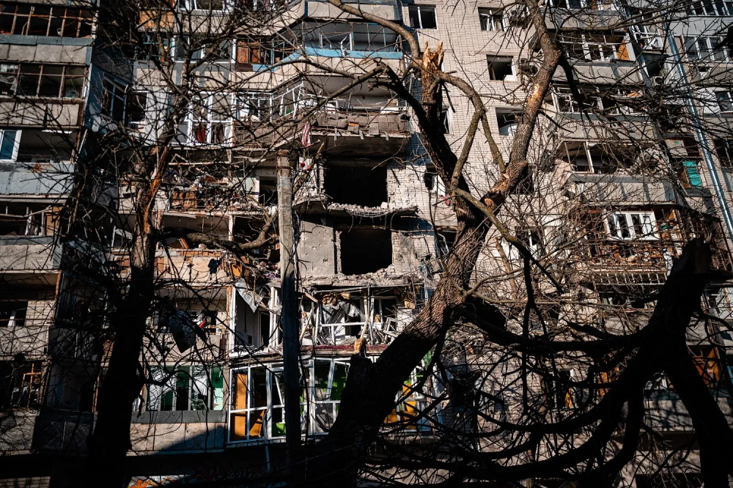 This photograph taken on December 20, 2022, shows a residential building damaged by Russian shelling in Kherson, amid the Russian invasion of Ukraine. (AFP)