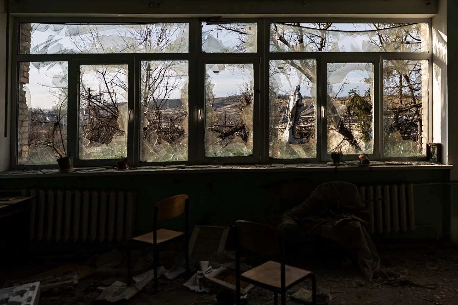 This photograph taken on December 20, 2022, shows destruction at a school in the village of Bohorodychne, eastern Ukraine. (AFP)