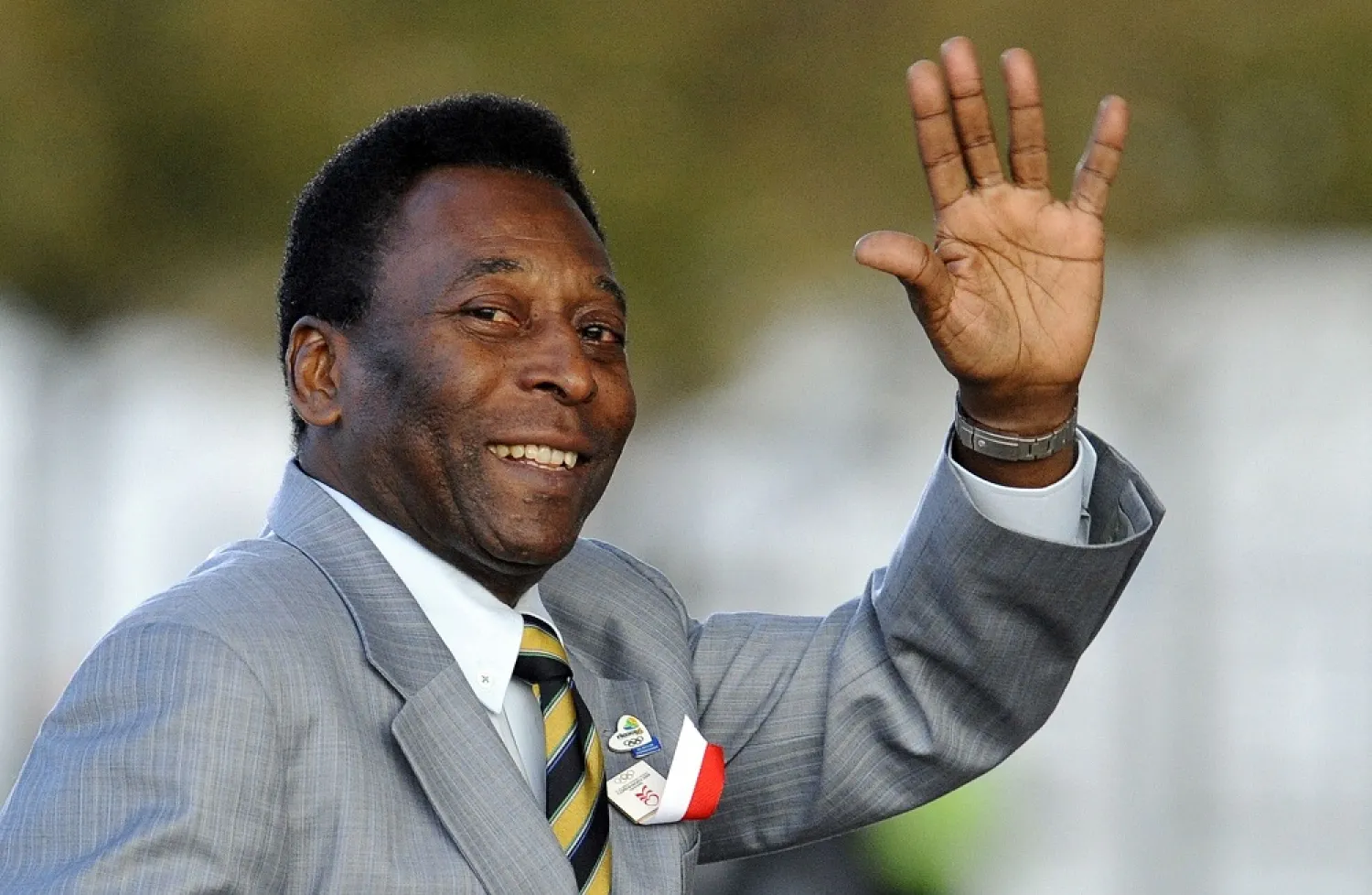 In this file photo taken on October 01, 2009, Brazilian former footballer Pele waves as he arrives for the opening ceremony of the 121st session of the International Olympic Congress in Copenhagen. (AFP)