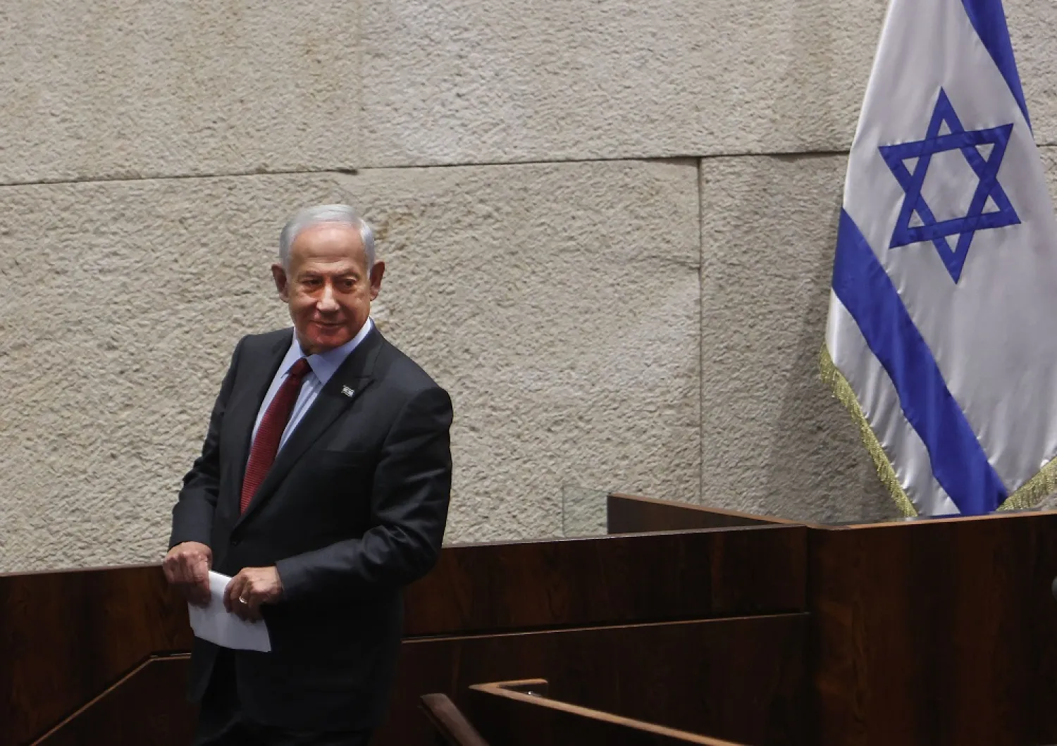 In this file photo taken on December 12, 2022 Israeli prime minister-designate Benjamin Netanyahu looks on after a speech at the Knesset (Israeli parliament) Plenum Hall during a session to elect the new speaker of the assembly in Jerusalem. (AFP)
