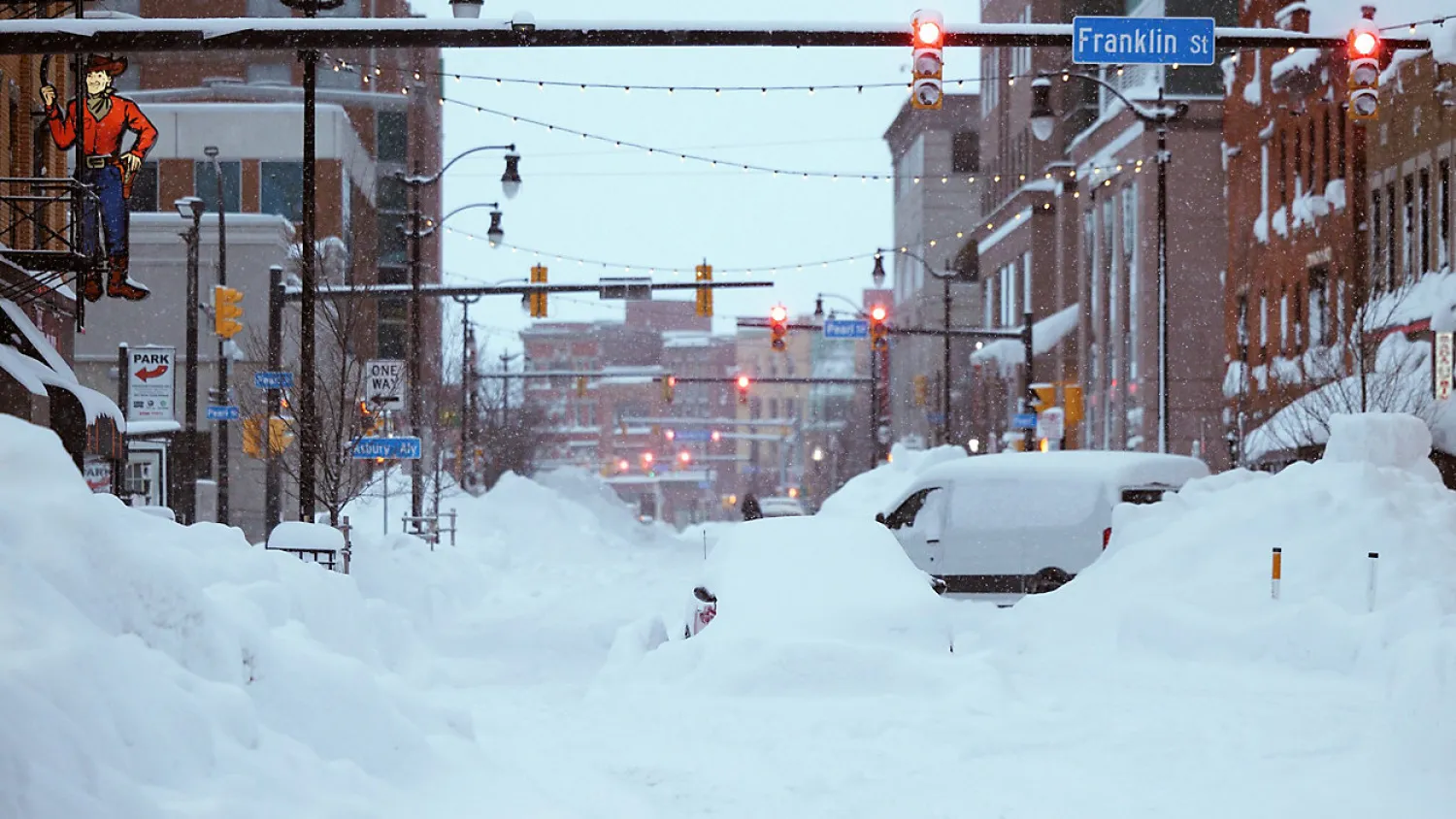This photo provided by the Twitter page of New York Gov. Kathy Hochul, snow from this weekends blizzard covers downtown Buffalo on Monday, Dec. 26, 2022. (Twitter page of New York Gov. Kathy Hochul via AP)