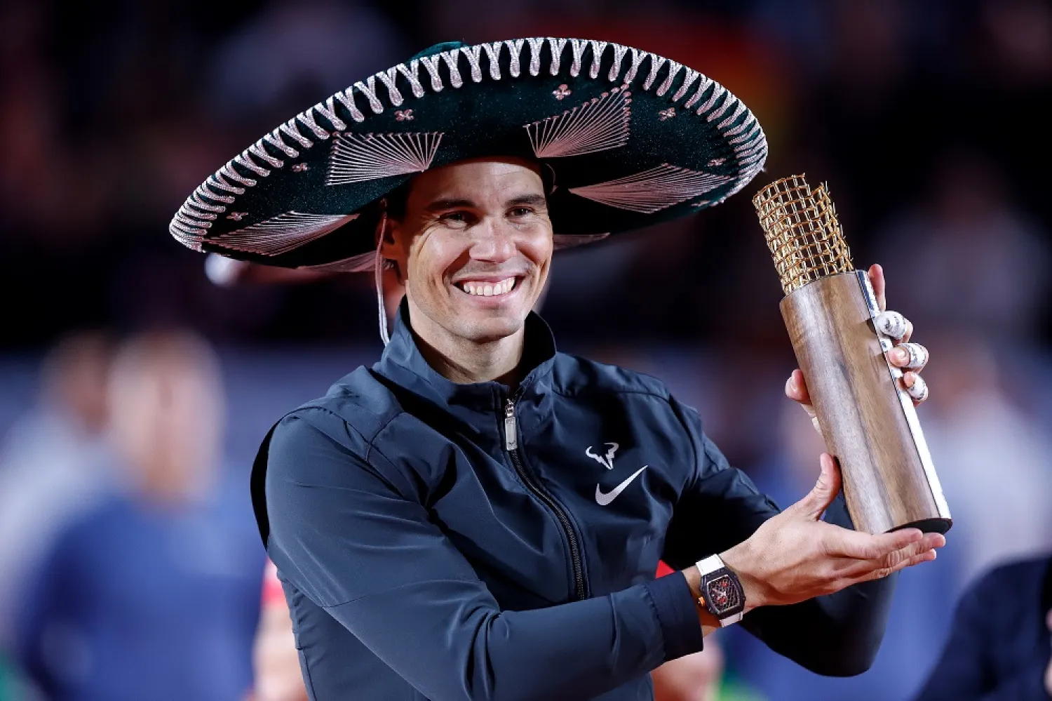Spanish tennis player Rafael Nadal celebrates his victory against Norwegian player Casper Ruud at the end of an exhibition match amid the Tennis Fest held at Mexico Bull Ring, in Mexico City, Mexico, 01 December 2022. (EPA)