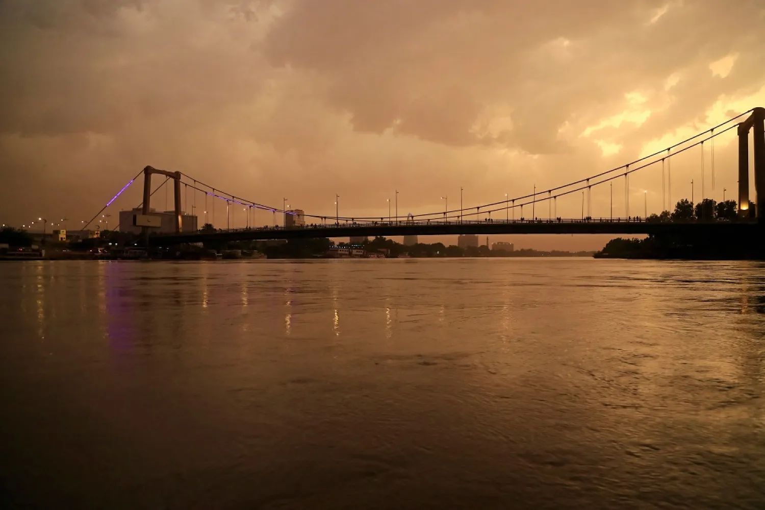 A picture shows a view of The Nile river at the bridge of Tuti Island in the center of Sudan's capital Khartoum at sunset, on September 15, 2022. (AFP)
