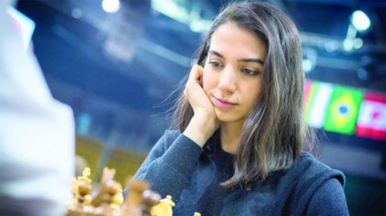 Iranian chess player Sara Khadem competes, without wearing a hijab, in FIDE World Rapid and Blitz Chess Championships in Almaty, Kazakhstan December 26, 2022, in this picture obtained by Reuters on December 27, 2022. Lennart Ootes/FIDE/via REUTERS