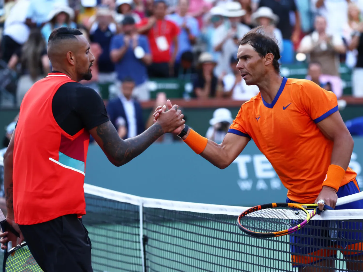 Rafael Nadal (R) says 'of course' Nick Kyrgios (L) can win a Grand Slam. CLIVE BRUNSKILL / GETTY IMAGES NORTH AMERICA/AFP

