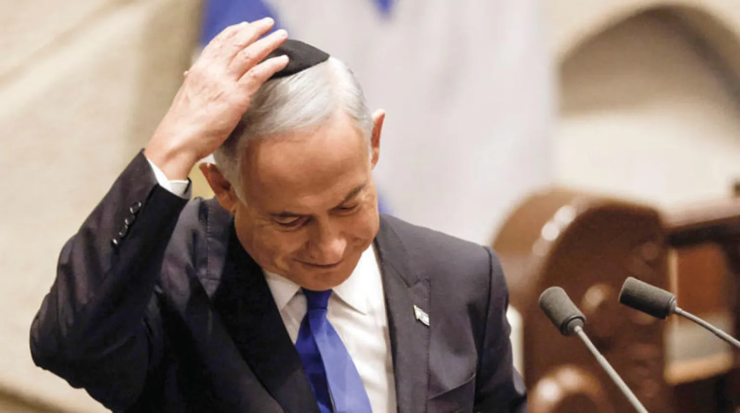 نتنياهو يلقي كلمته أمام الكنيست أمس (أ.ف.ب)