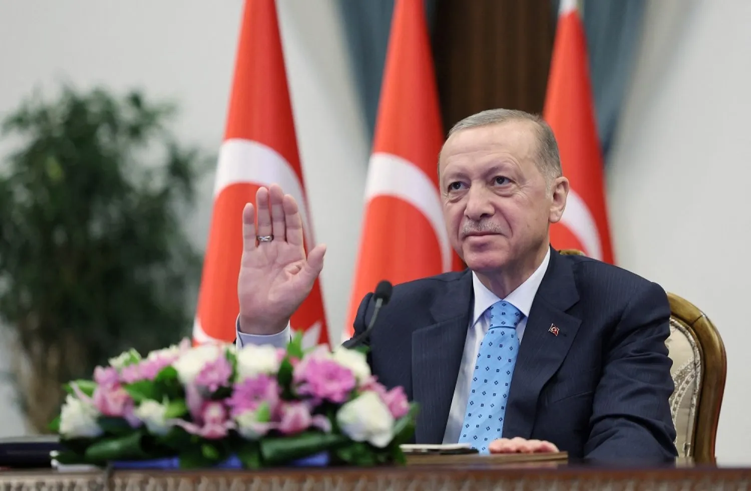 Turkish President Recep Tayyip Erdogan attends a ceremony to mark the delivery of nuclear fuel to Türkiye's Akkuyu nuclear power plant, which is being built by Russia, in Ankara, Türkiye, April 27, 2023. (Reuters)

