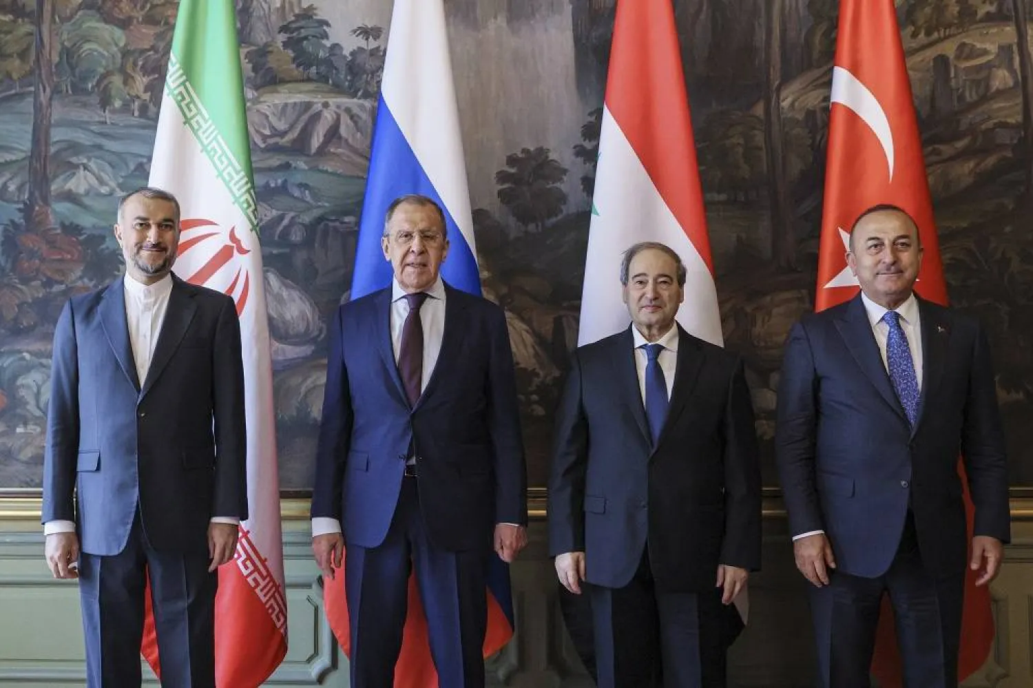 A handout picture made available by Russian Foreign ministry press service shows (L-R) Iranian Foreign Minister Hossein Amir Abdollahian, Russian Foreign Minister Sergei Lavrov, Syrian Foreign Minister Faisal Mekdad and Turkish Foreign Minister Mevlut Cavusoglu posing for a family photo during a meeting in Moscow, Russia, 10 May 2023. (EPA / Russian Foreign ministry press service) 