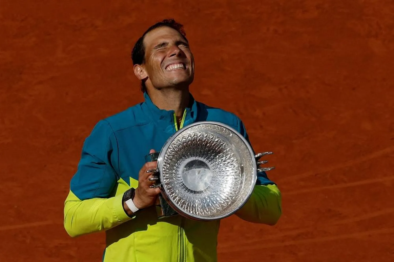 Tennis - French Open - Roland Garros, Paris, France - June 5, 2022 Spain's Rafael Nadal celebrates with trophy after winning the men's singles final against Norway's Casper Ruud. (Reuters) 