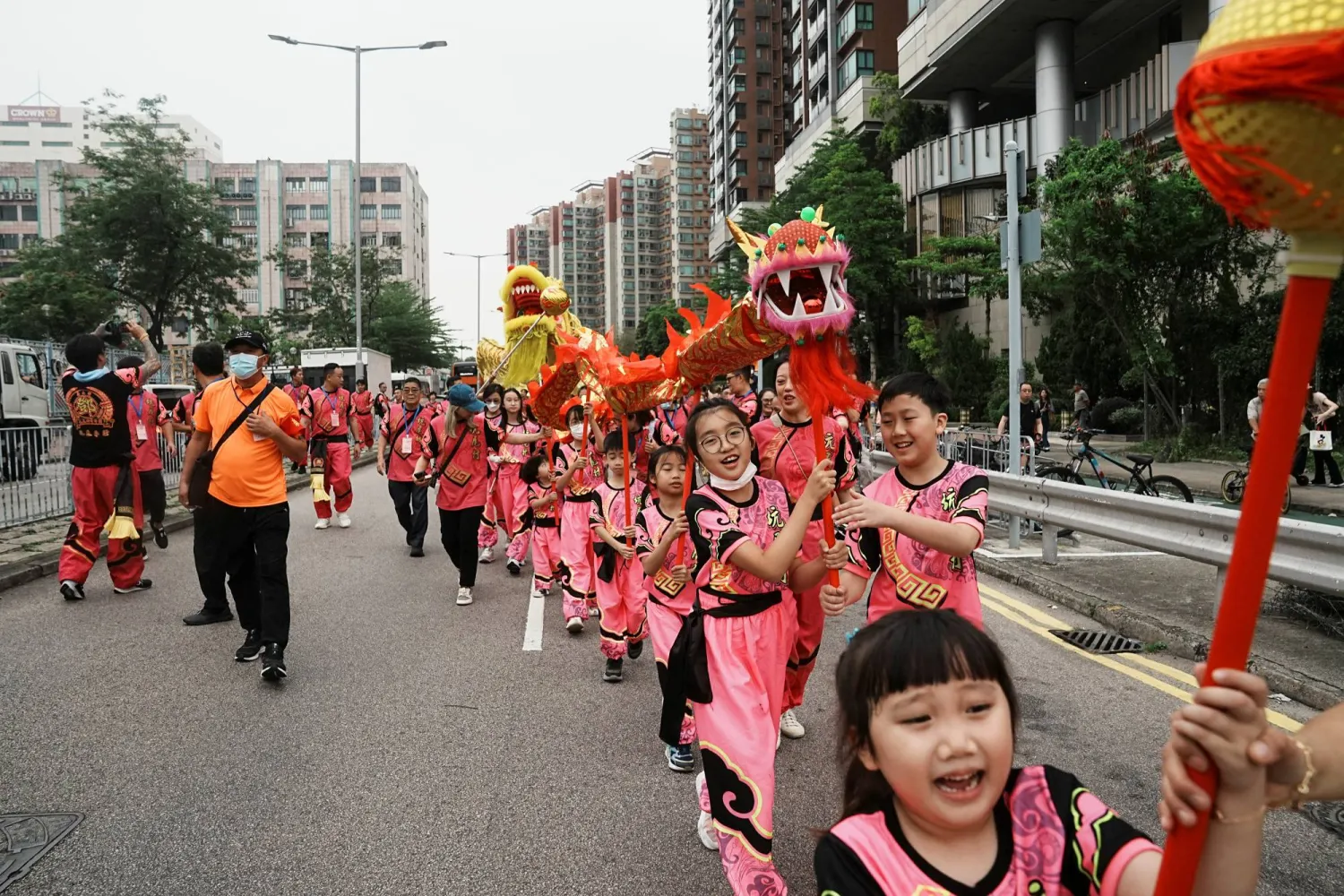 Young participants perform dragon dance during a parade celebrating Tin Hau festival at Yuen Long district, in Hong Kong, China May 12, 2023. REUTERS/Lam Yik