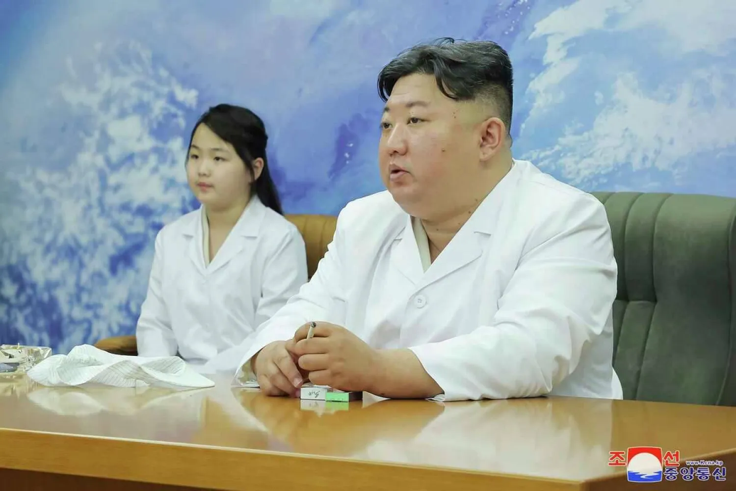 In this photo provided by the North Korean government, North Korean leader, Kim Jong Un, right, and his daughter visit the country's aerospace agency North Korea Tuesday, May 16, 2023. (Korean Central News Agency/Korea News Service via AP)
