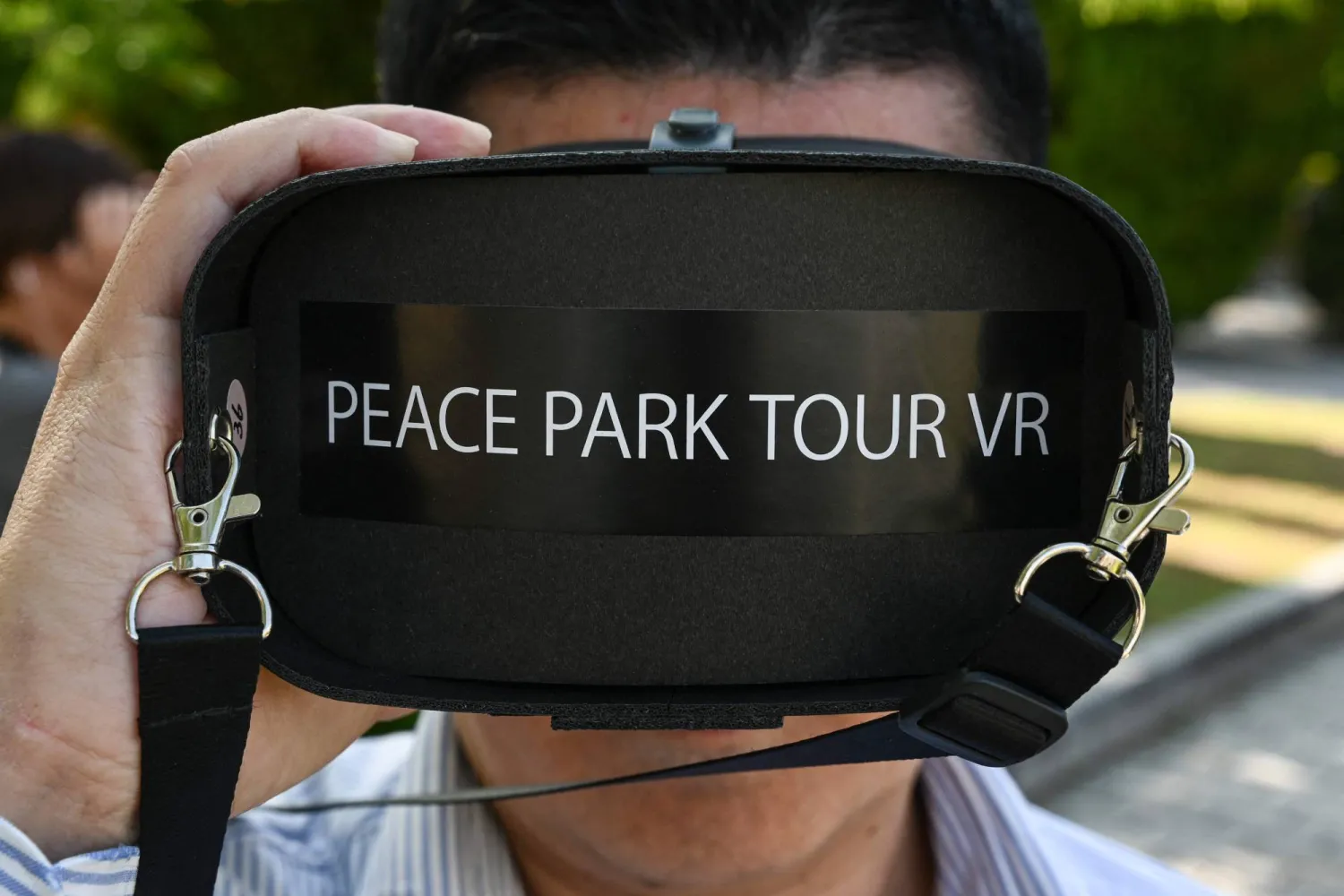 هيروشي ياماغوتشي الذي تقدم شركته جولة في الواقع الافتراضي (VR) (أ.ف.ب)