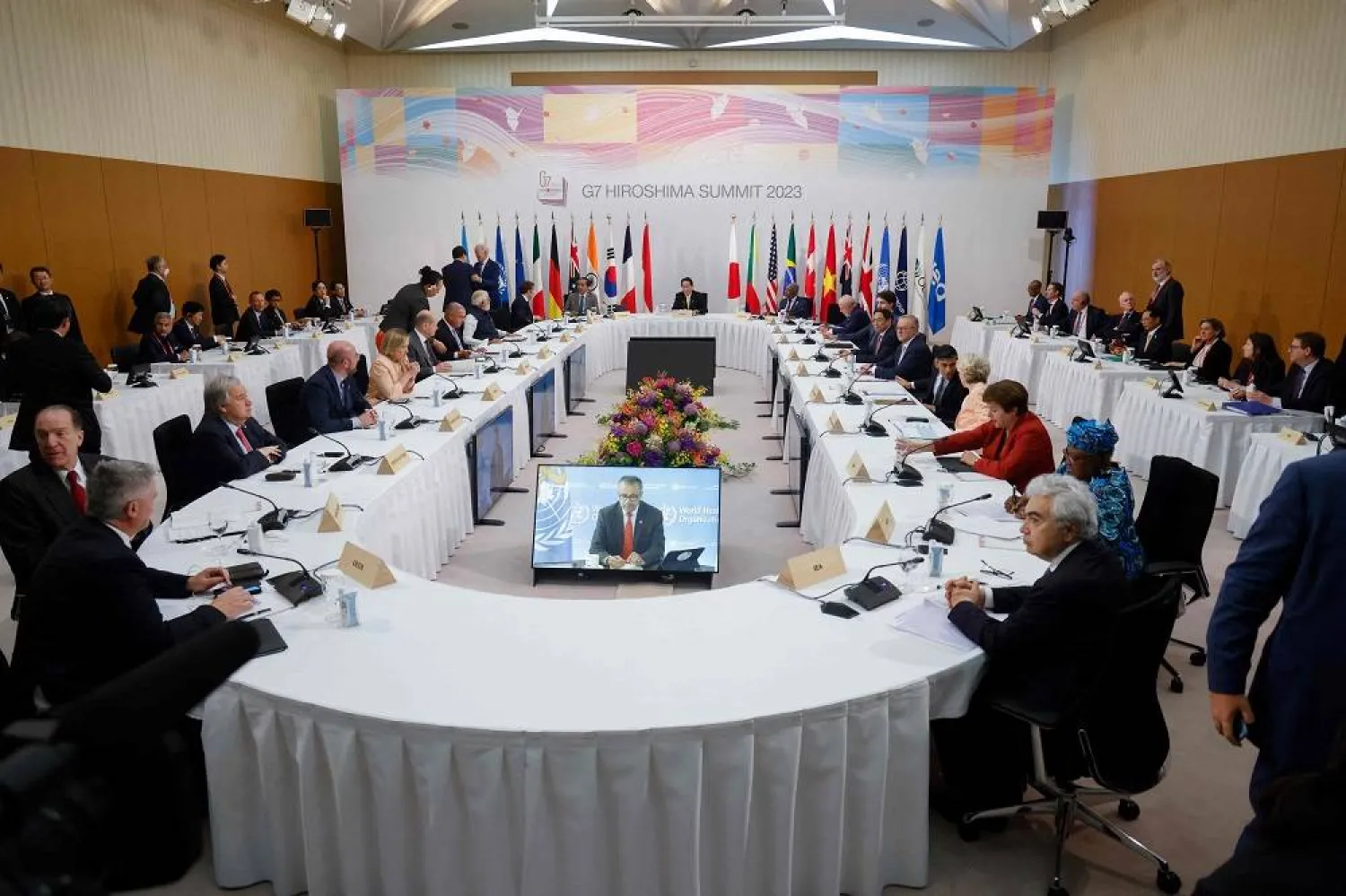 Japan's Prime Minister Fumio Kishida (C) hosts a working session as part of the G7 Leaders' Summit in Hiroshima on May 20, 2023. (AFP) 