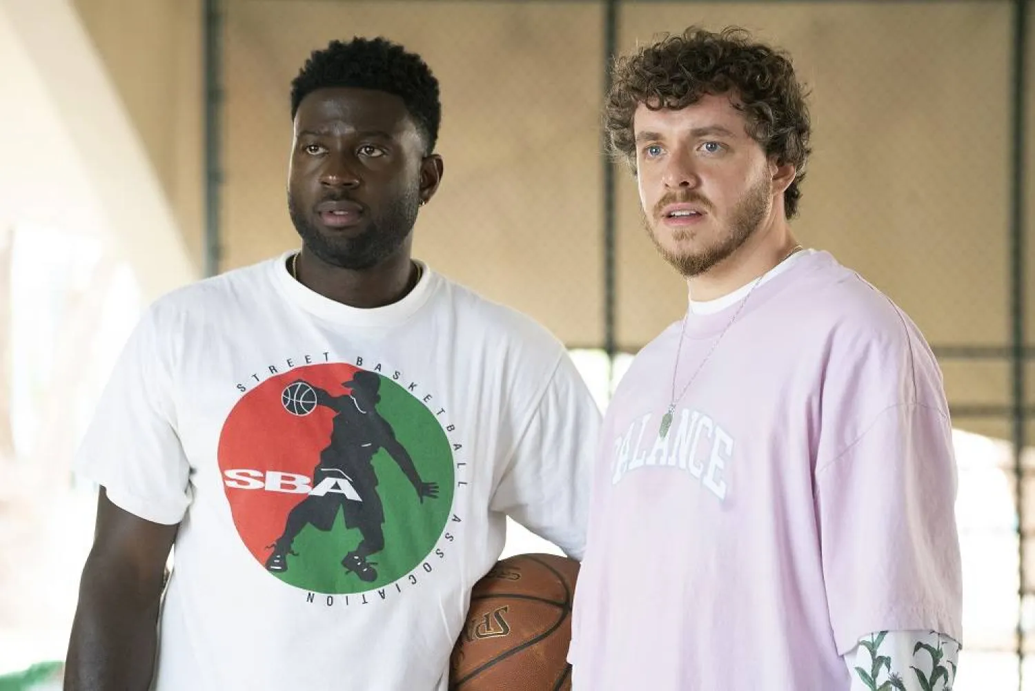 This image released by 20th Century Studios shows Sinqua Walls as Kamal, left, and Jack Harlow as Jeremy in a scene from "White Men Can't Jump." (20th Century Studios via AP) 
