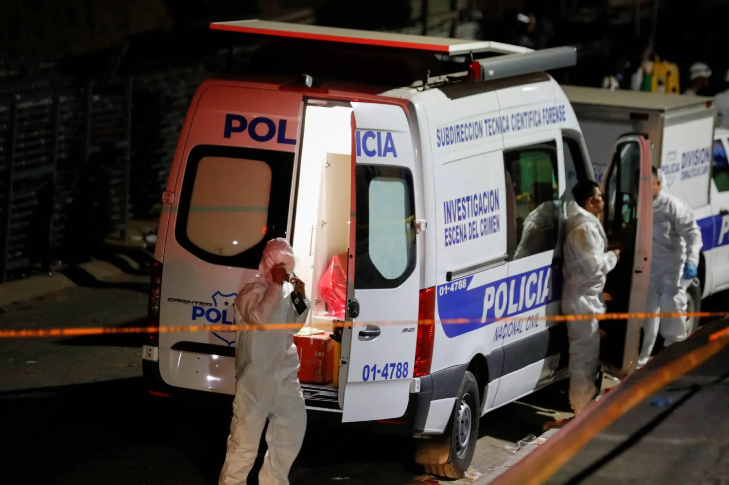 Members of the forensic team wait outside the Cuzcatlan stadium following a stampede that happened prior to a soccer game between C.D. FAS Vs. Alianza F.C., in San Salvador, El Salvador May 20, 2023. REUTERS/ Jose Cabezas