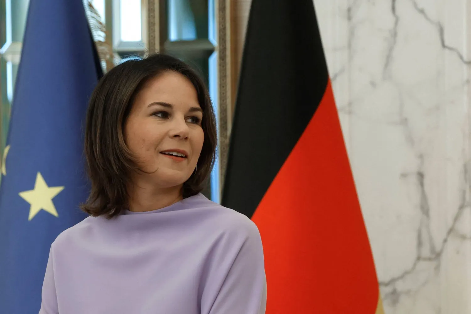 German Foreign Minister Annalena Baerbock attends a press conference. (Photo by KARIM JAAFAR / AFP)