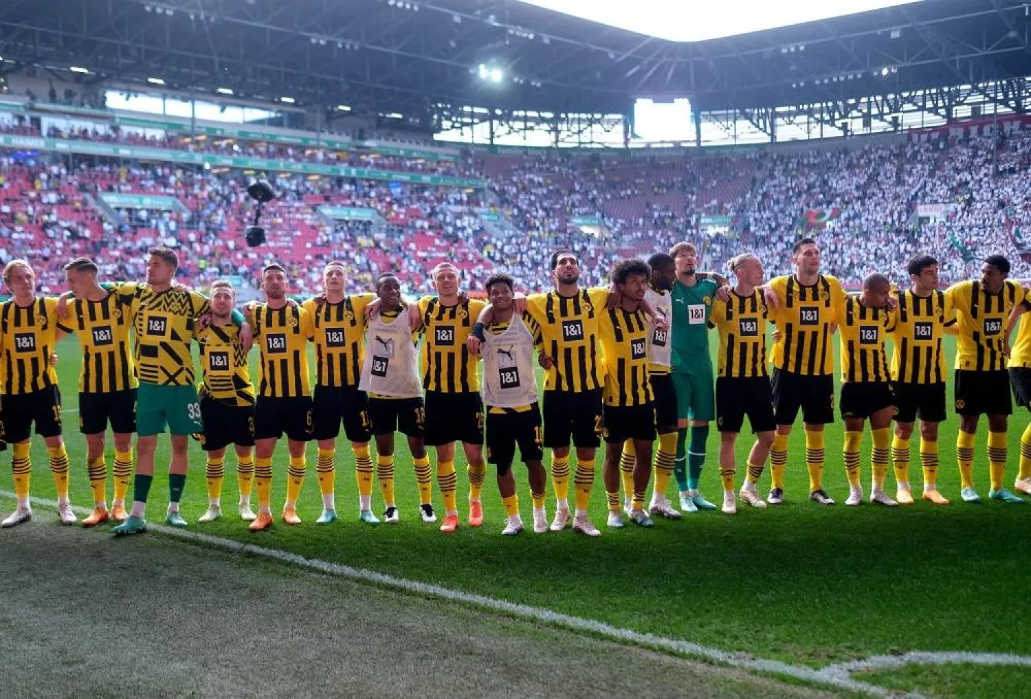 Football - Bundesliga - FC Augsburg v Borussia Dortmund - WWK Arena, Augsburg, Germany - May 21, 2023 Borussia Dortmund players celebrate after the match. (Reuters) 