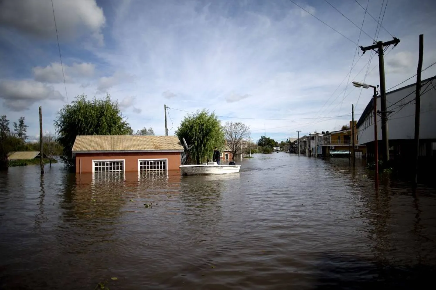 Roads are flooded in Villa Paranacito, Entre Rios, Argentina, Thursday, April 28, 2016. (AP) 