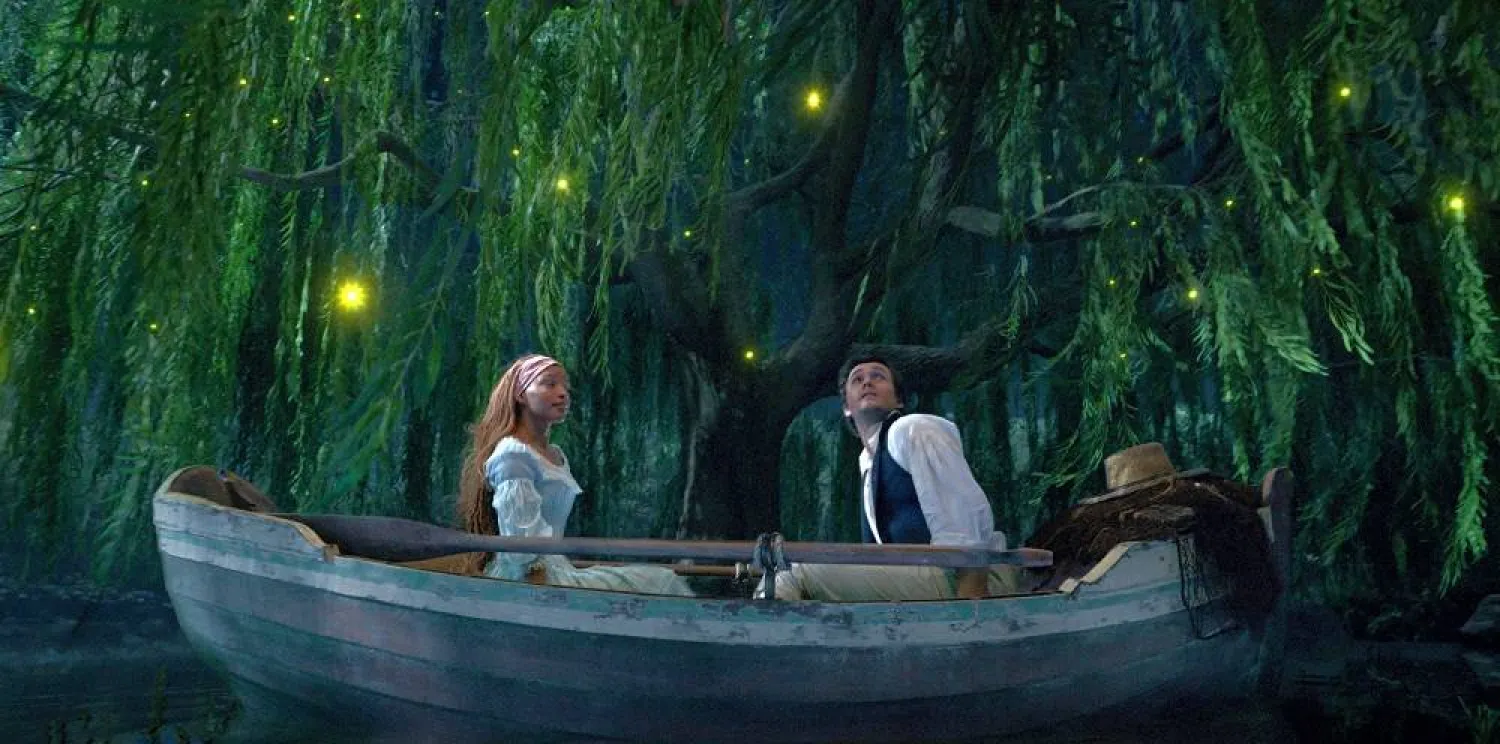  This image released by Disney shows Halle Bailey as Ariel and Jonah Hauer-King as Prince Eric in "The Little Mermaid." (Disney via AP) 