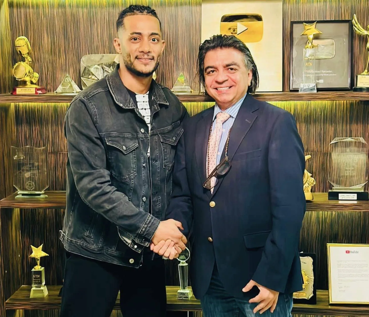 الدكتور جمال شعبان والفنان محمد رمضان (صفحة جمال شعبان بفيسبوك)