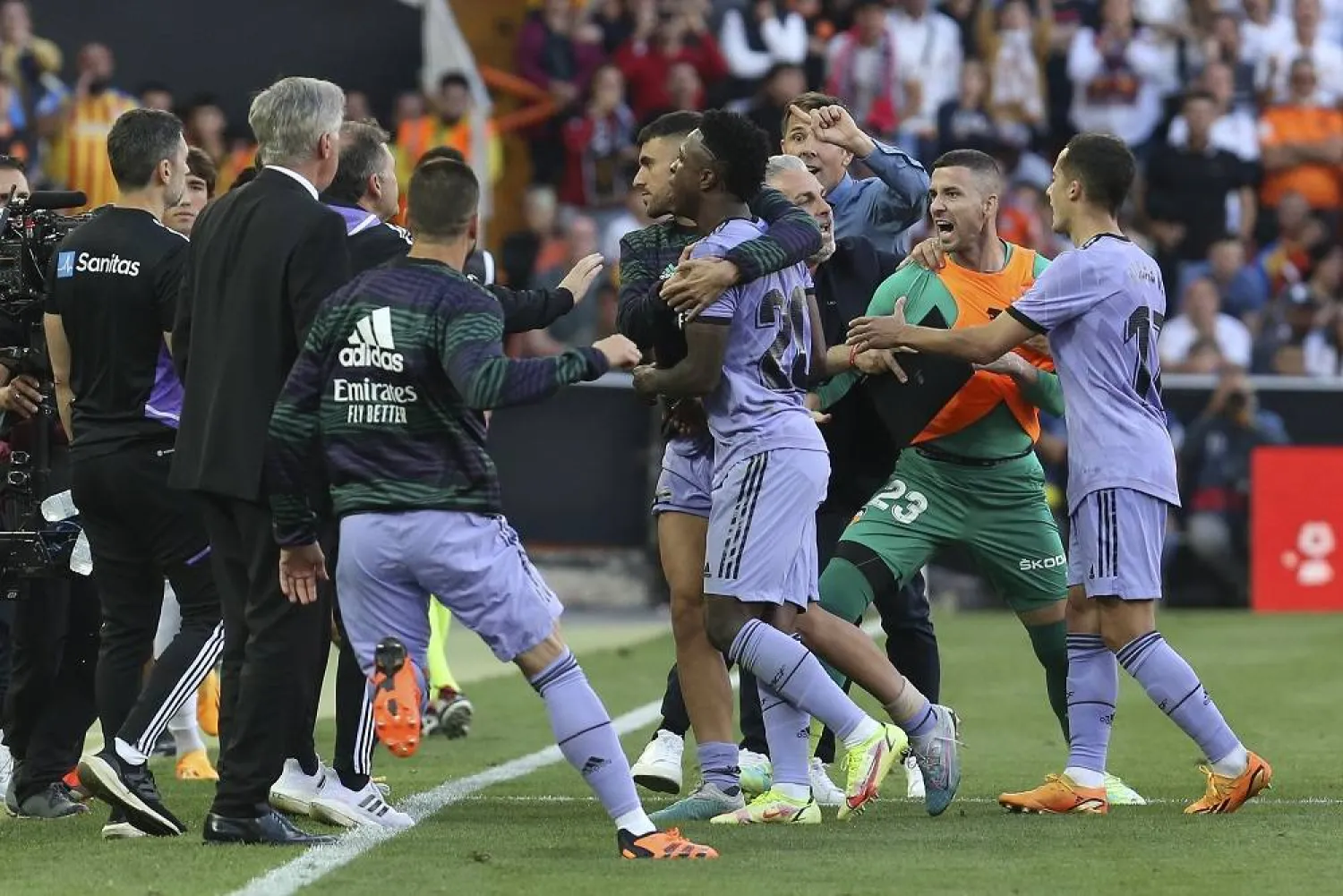 Real Madrid's Vinicius Junior, center, leaves the pitch after being shown a red card during a Spanish LaLiga match between Valencia and Real Madrid, at the Mestalla stadium in Valencia, Spain, Sunday, May 21, 2023. (AP) 