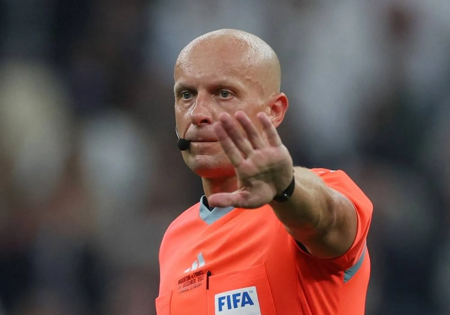 Football - FIFA World Cup Qatar 2022 - Final - Argentina v France - Lusail Stadium, Lusail, Qatar - December 18, 2022, Referee Szymon Marciniak reacts. (Reuters) 