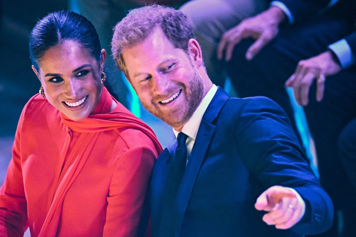 (FILES) Britain's Meghan, Duchess of Sussex (L) and Britain's Prince Harry, Duke of Sussex, attend the annual One Young World Summit at Bridgewater Hall in Manchester, north-west England on September 5, 2022. (Photo by Oli SCARFF / AFP)
