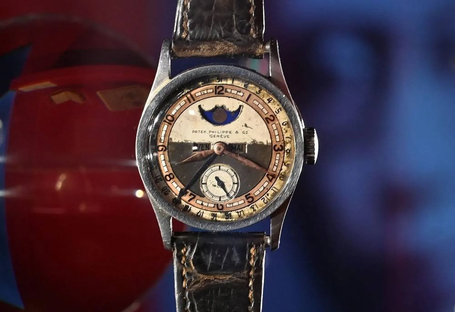 The Patek Philippe Ref 96 Quantieme Lune timepiece once owned by Aisin-Gioro Puyi, the Chinese Qing dynasty’s last emperor (R), is seen on display in Hong Kong on May 23, 2023 ahead of its auction in the territory on the same day. (AFP) 