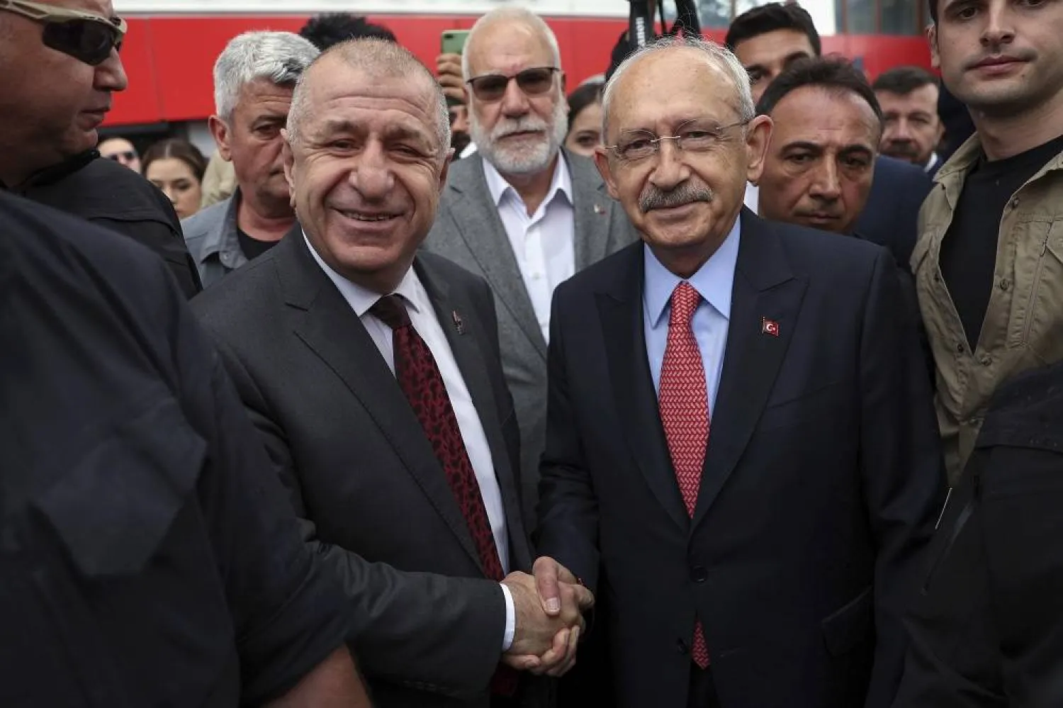 In this handout photo released by Turkish Republican People's Party, CHP, Turkish CHP party leader and Nation Alliance's presidential candidate Kemal Kilicdaroglu, right, shakes with Umit Ozdag, the leader of the far-right Victory Party, following their meeting in Ankara, Türkiye, Wednesday, May 24, 2023. (CHP via AP) 