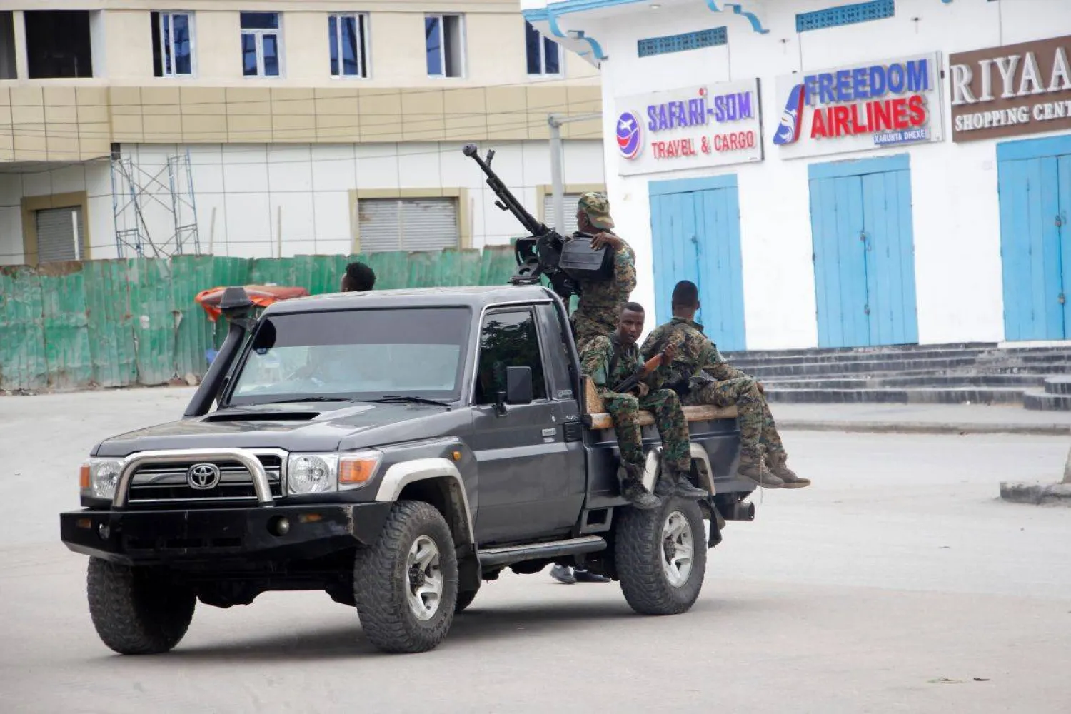 Soldiers patrol outside the Hayat Hotel in Mogadishu, Somalia. (AP) 