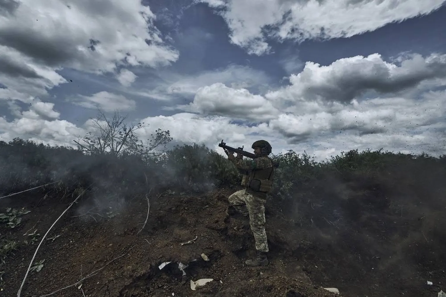 A Ukrainian soldier fires an RPG toward Russian positions at the frontline near Bakhmut in the Donetsk region, Ukraine, Monday, May 22, 2023. (AP) 