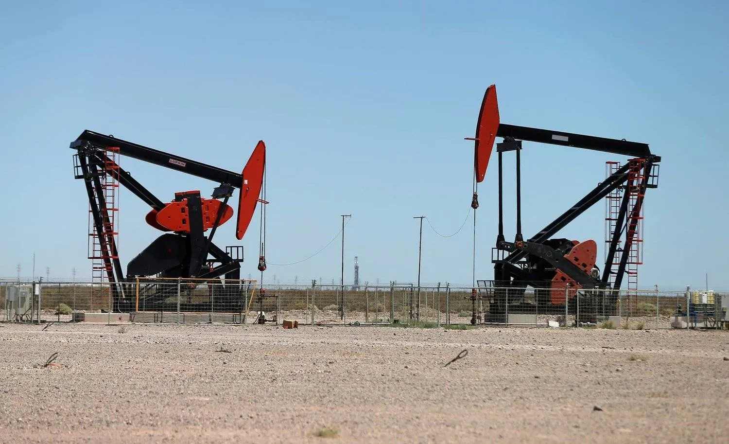 Pumpjacks operating in a shale oilfield in Argentina while markets’ turmoil continues amid ambiguity in the talks regarding the US debt ceiling. (Reuters) 