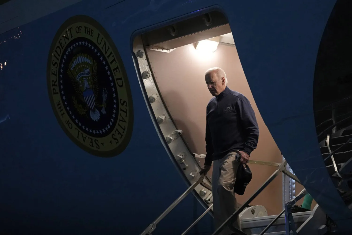 President Joe Biden deplanes Air Force One at Andrews Air Force Base, Md., late Sunday, May 21, 2023, after returning from the G7 Summit in Hiroshima, Japan. (AP Photo/Susan Walsh)