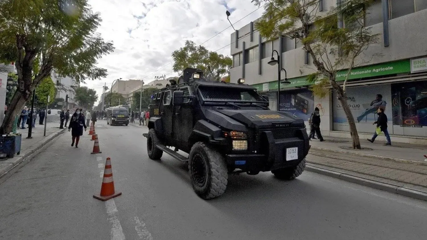 Tunisian security forces patrol along Habib Bourguiba avenue in the capital Tunis, on January 14, 2022. (AFP)
