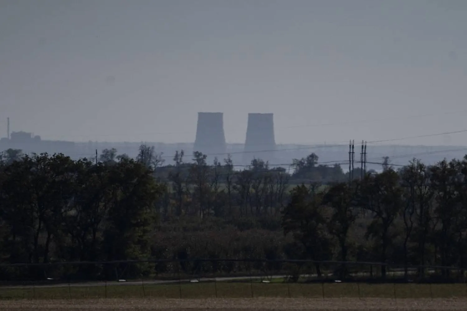 The Zaporizhzhia nuclear power plant is seen from around twenty kilometers away in an area in the Dnipropetrovsk region, Ukraine, Monday, Oct. 17, 2022. (AP) 