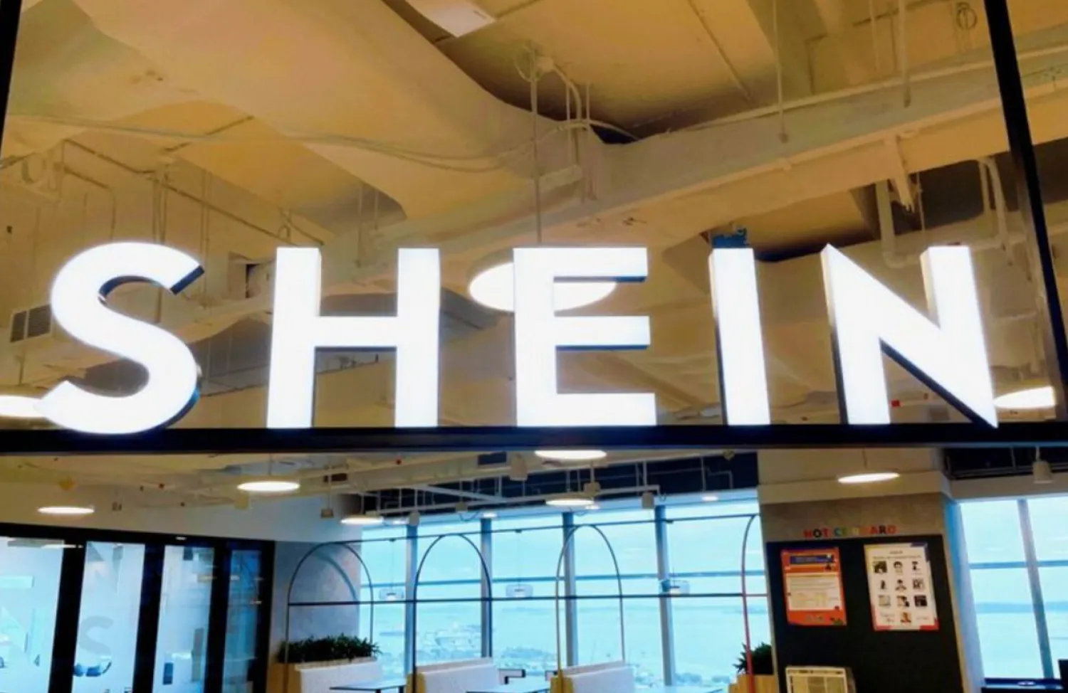 FILE PHOTO: A Shein logo is pictured at the company's office in the central business district of Singapore, October 18, 2022. REUTERS/Chen LinREUTERS

