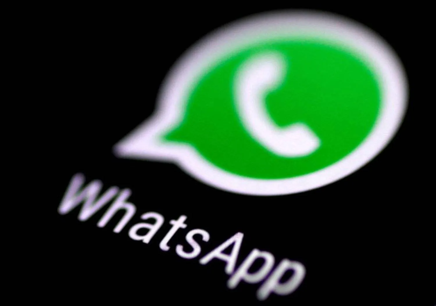 The WhatsApp messaging application is seen on a phone screen August 3, 2017. REUTERS/Thomas White/File Photo
