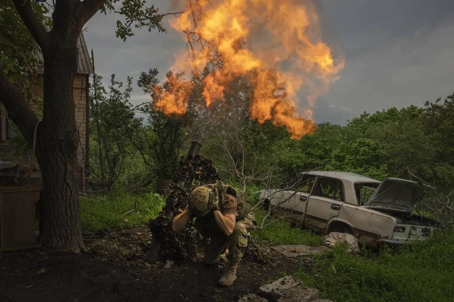 A Ukrainian soldier fires a mortar at Russian positions on the frontline near Bakhmut, Donetsk region, Ukraine, Sunday, May 28, 2023. (AP) 